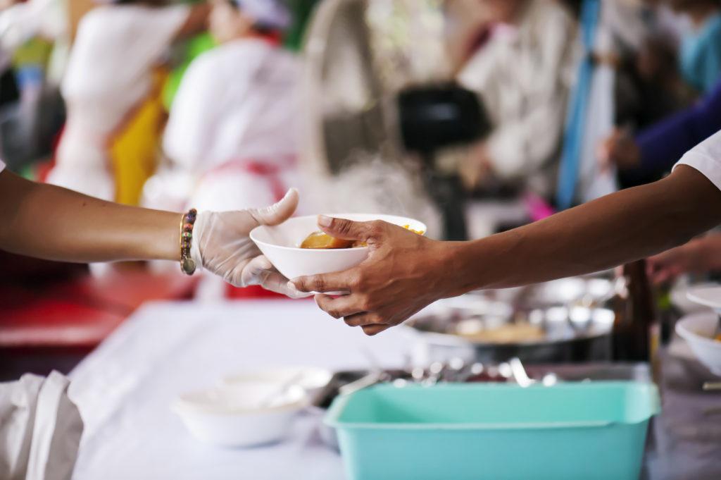 Sharing of food from volunteer hands to homeless people : The concept of feeding